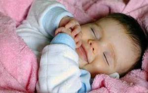 نی نی/ علت لبخند نوزاد در خواب