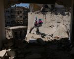 نقاشی روی دیوار خانه ویران شده از جنگ در شهر دوما سوریه
