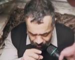 مداحی محمود کریمی داخل قبر شهید مدافع حرم + فیلم