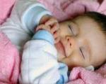 نی نی/ علت لبخند نوزاد در خواب