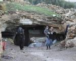 تصاویر :  زندگی خانواده های سوری در غارها